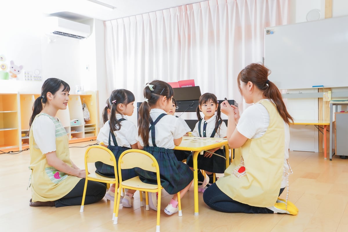 Children and teacher at nursery school